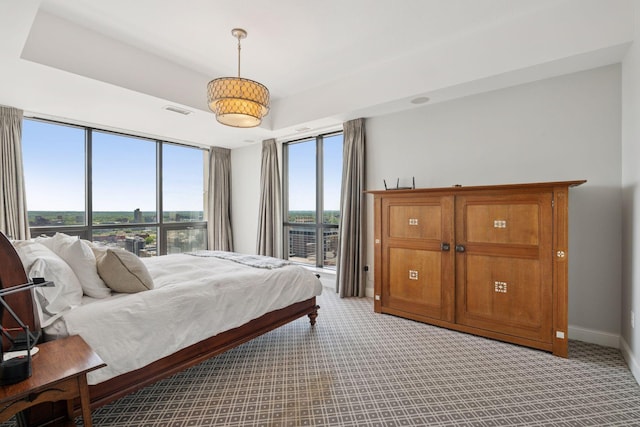 100 3rd Ave S Unit 3301, Minneapolis, MN 55401 - bedroom with carpet, a wall of windows, and baseboards