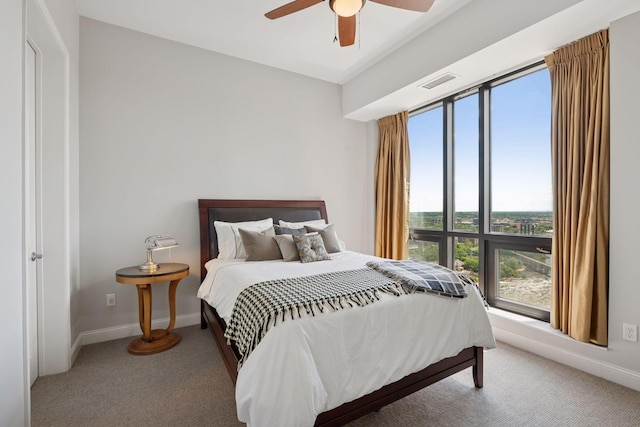 100 3rd Ave S Unit 3301, Minneapolis, MN 55401 - bedroom featuring carpet flooring, baseboards, and ceiling fan