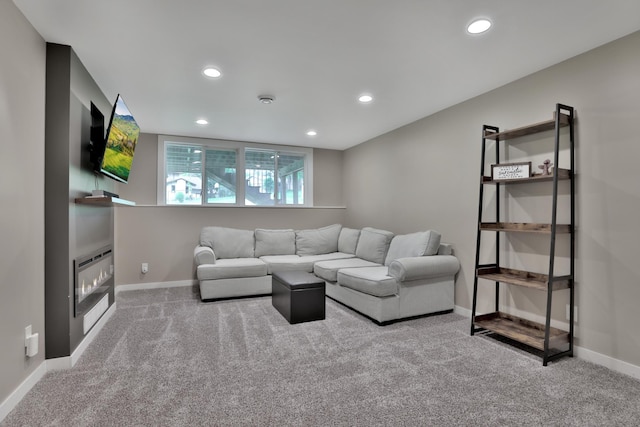 8466 Isleton Ct S, Cottage Grove, MN 55016 - carpeted living area featuring recessed lighting, baseboards, and a glass covered fireplace
