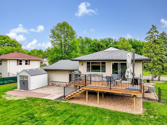 8466 Isleton Ct S, Cottage Grove, MN 55016 - rear view of house featuring a wooden deck, a shingled roof, stairs, and a patio