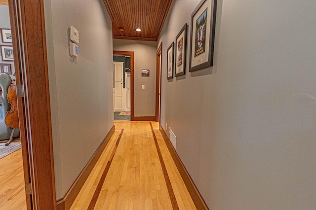 8599 County Road 21 SW, Alexandria, MN 56308 - hall with light wood-style flooring, baseboards, wooden ceiling, and recessed lighting
