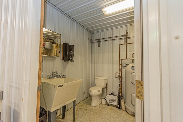 8599 County Road 21 SW, Alexandria, MN 56308 - bathroom with toilet, a sink, and water heater
