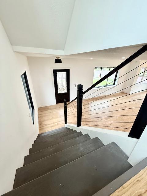 503 3rd St, Redwood Falls, MN 56283 - staircase featuring wood finished floors