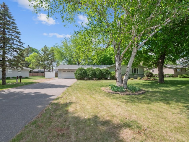 835 Winona Dr SW, Alexandria, MN 56308 - view of front of house with asphalt driveway