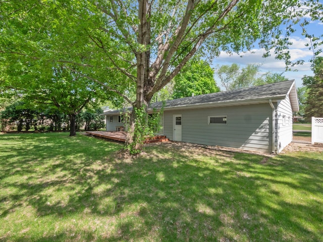 835 Winona Dr SW, Alexandria, MN 56308 - view of green lawn featuring a deck