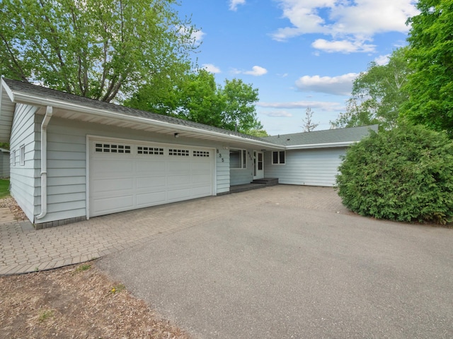 835 Winona Dr SW, Alexandria, MN 56308 - ranch-style house with asphalt driveway and a garage