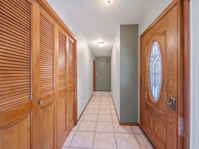 835 Winona Dr SW, Alexandria, MN 56308 - entrance foyer with light tile patterned floors and baseboards