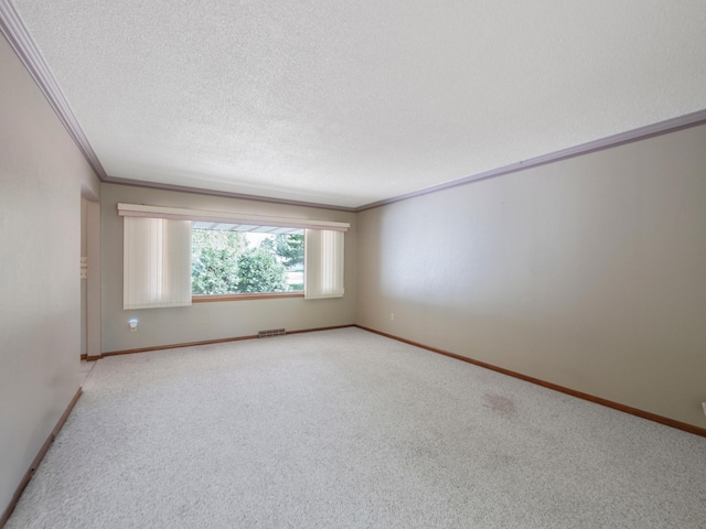 835 Winona Dr SW, Alexandria, MN 56308 - unfurnished room featuring light carpet, crown molding, a textured ceiling, and baseboards