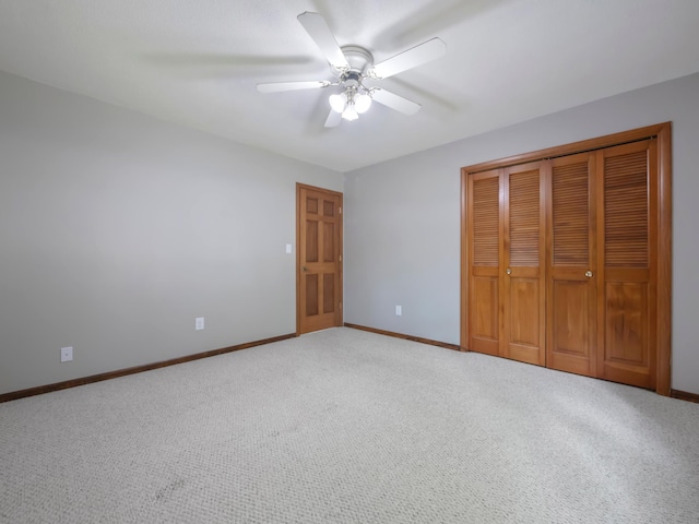 835 Winona Dr SW, Alexandria, MN 56308 - unfurnished bedroom with baseboards, carpet flooring, a closet, and ceiling fan