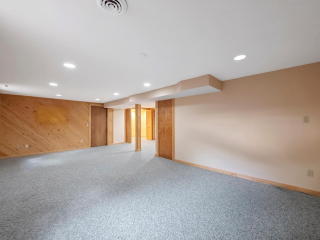 835 Winona Dr SW, Alexandria, MN 56308 - carpeted spare room with recessed lighting, baseboards, and wooden walls