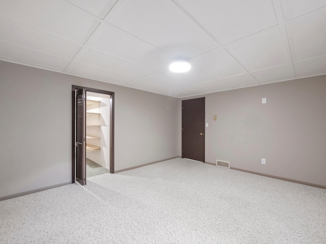 835 Winona Dr SW, Alexandria, MN 56308 - unfurnished room with baseboards and a drop ceiling