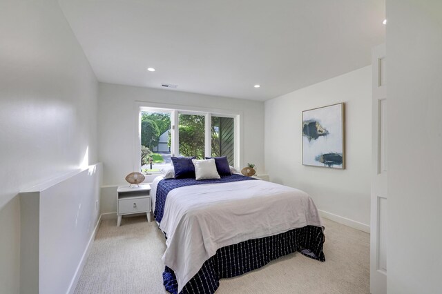 745 Virginia Shores Cir, Victoria, MN 55331 - bedroom featuring light carpet, baseboards, and recessed lighting