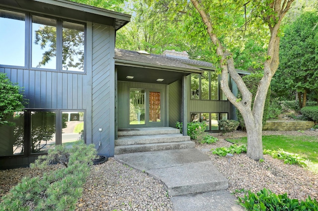 745 Virginia Shores Cir, Victoria, MN 55331 - view of exterior entry featuring a chimney