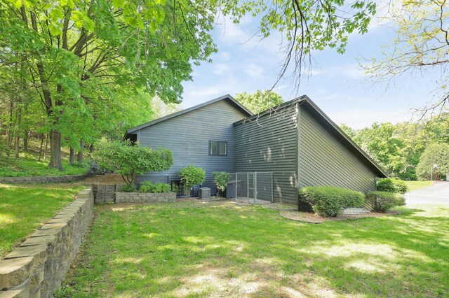 745 Virginia Shores Cir, Victoria, MN 55331 - view of side of property featuring a lawn and central AC
