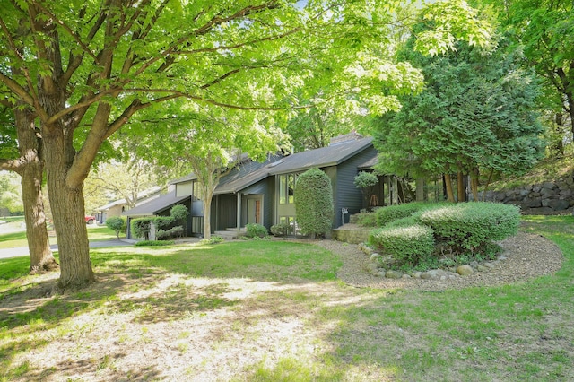 745 Virginia Shores Cir, Victoria, MN 55331 - view of side of home featuring a yard