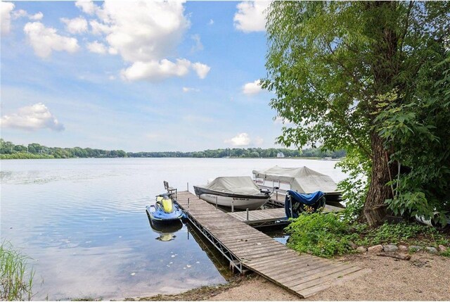 745 Virginia Shores Cir, Victoria, MN 55331 - dock featuring a water view and boat lift