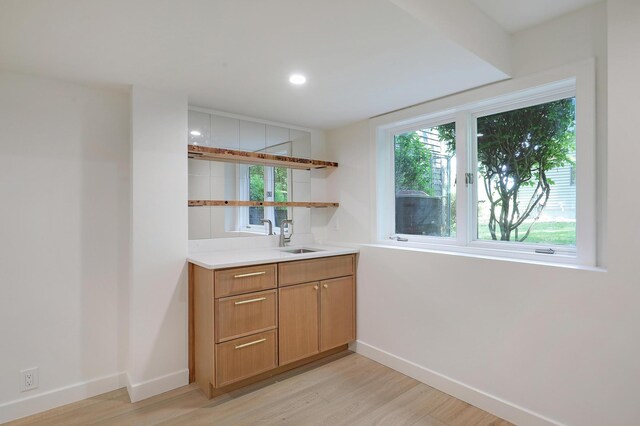 745 Virginia Shores Cir, Victoria, MN 55331 - bar with a sink, baseboards, light wood-type flooring, and recessed lighting