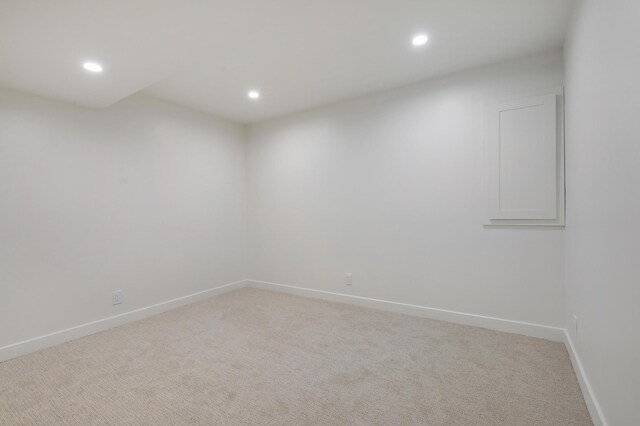 745 Virginia Shores Cir, Victoria, MN 55331 - unfurnished room with recessed lighting, baseboards, and light carpet