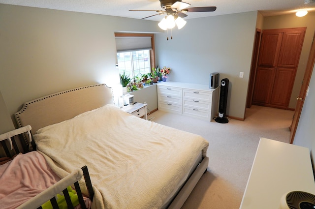 9467 Golden Eagle Ln, Monticello, MN 55362 - bedroom featuring light carpet and a ceiling fan