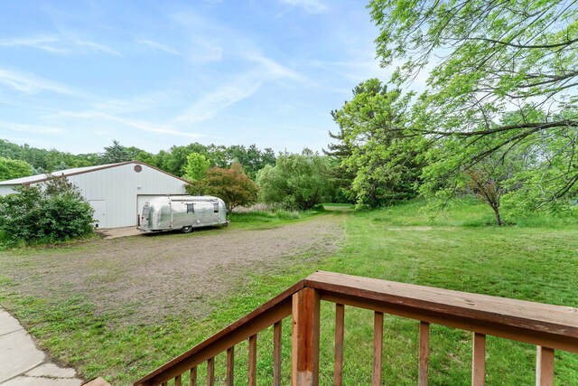 1231 135th St, Amery, WI 54005 - view of grassy yard featuring an outbuilding