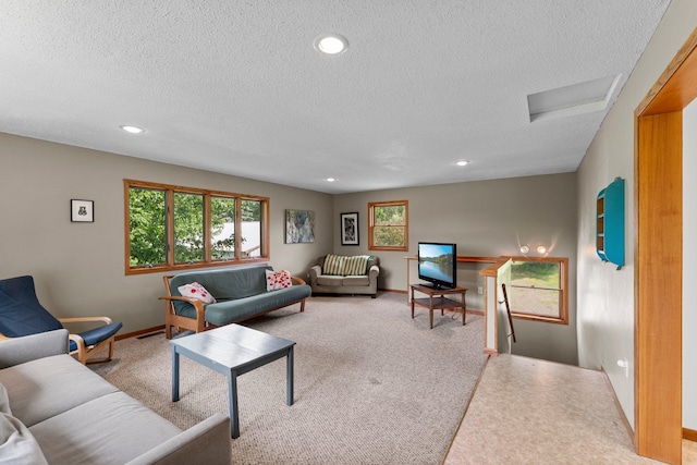 1231 135th St, Amery, WI 54005 - carpeted living room featuring attic access, a textured ceiling, and recessed lighting