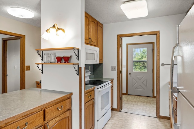 1231 135th St, Amery, WI 54005 - kitchen featuring white appliances, brown cabinetry, open shelves, and a textured ceiling