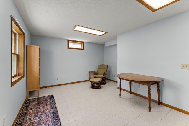 1231 135th St, Amery, WI 54005 - sitting room featuring baseboards and a textured ceiling