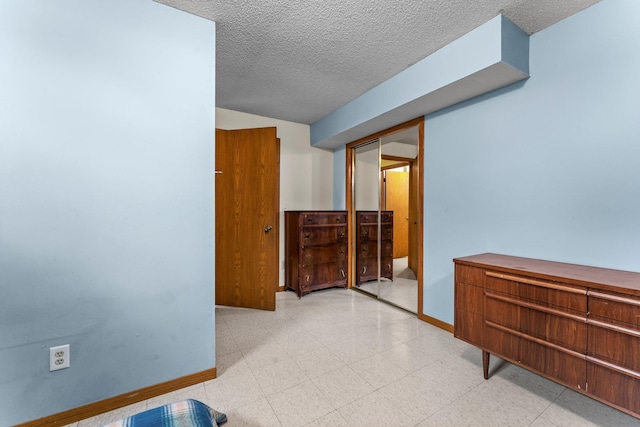 1231 135th St, Amery, WI 54005 - bedroom with a textured ceiling and a closet