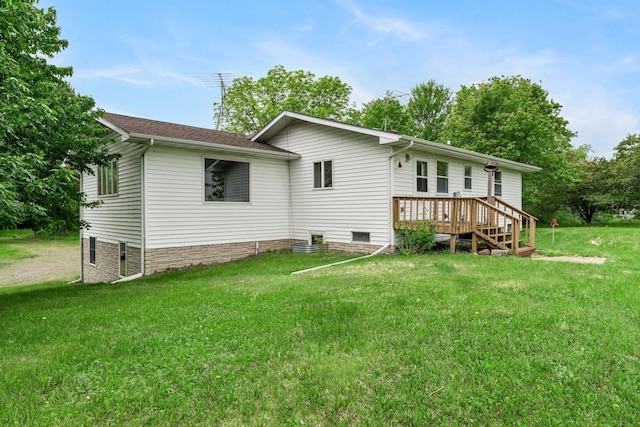 1231 135th St, Amery, WI 54005 - rear view of property with a lawn and a wooden deck