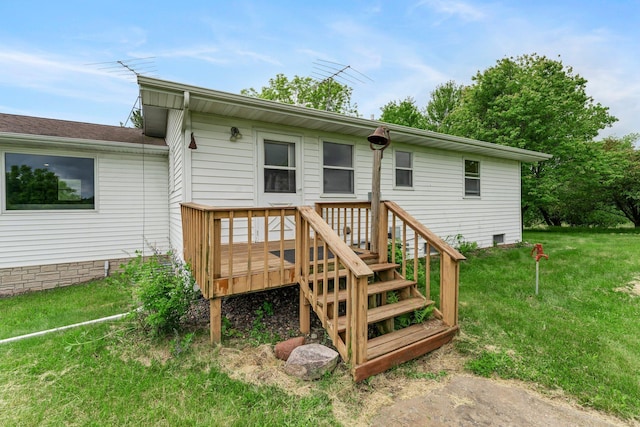 1231 135th St, Amery, WI 54005 - back of house with a lawn and a wooden deck