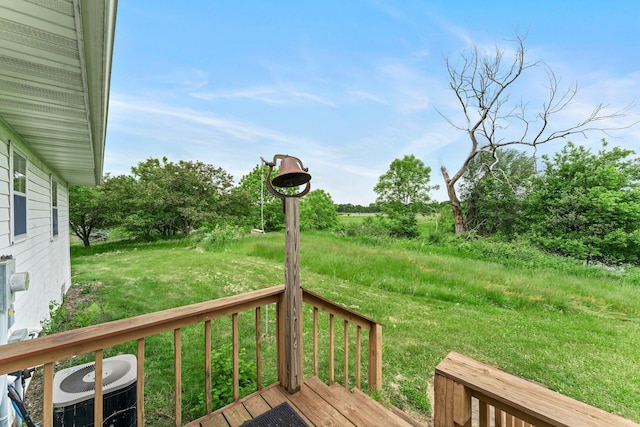1231 135th St, Amery, WI 54005 - wooden deck featuring a lawn