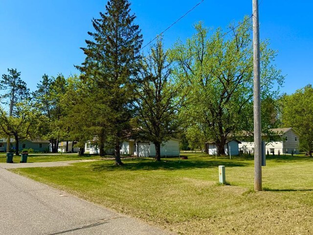 65 6th Ave S, Motley, MN 56466 - view of front of home with a front lawn