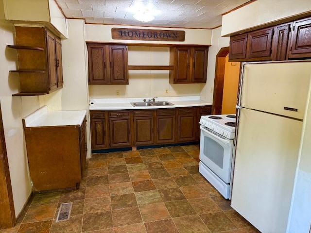 65 6th Ave S, Motley, MN 56466 - kitchen with white appliances, open shelves, a sink, stone finish flooring, and light countertops