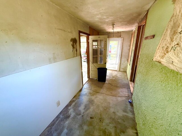 65 6th Ave S, Motley, MN 56466 - hallway with concrete flooring