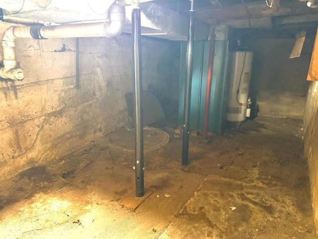 65 6th Ave S, Motley, MN 56466 - unfinished basement featuring gas water heater
