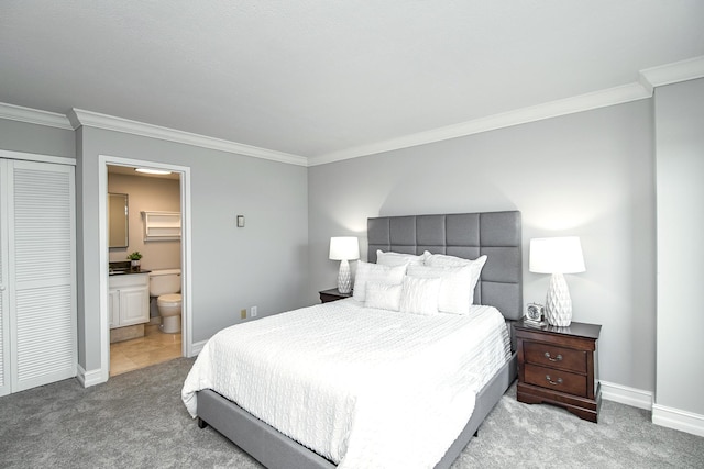 207 5th Ave SW Unit 901, Rochester, MN 55902 - carpeted bedroom featuring ornamental molding, baseboards, and ensuite bathroom