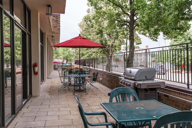 207 5th Ave SW Unit 901, Rochester, MN 55902 - view of patio / terrace featuring outdoor dining area and a grill