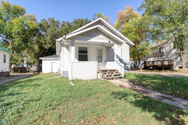 1010 University Dr N, Fargo, ND 58102 - view of front of home featuring a front yard and a porch