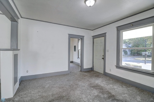 1010 University Dr N, Fargo, ND 58102 - unfurnished room featuring carpet flooring and baseboards