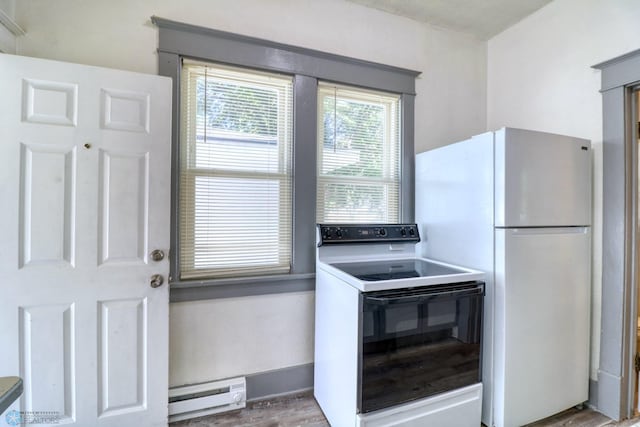 1010 University Dr N, Fargo, ND 58102 - washroom featuring a baseboard heating unit