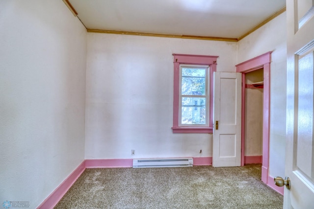 1010 University Dr N, Fargo, ND 58102 - unfurnished bedroom featuring baseboard heating, carpet, ornamental molding, and baseboards