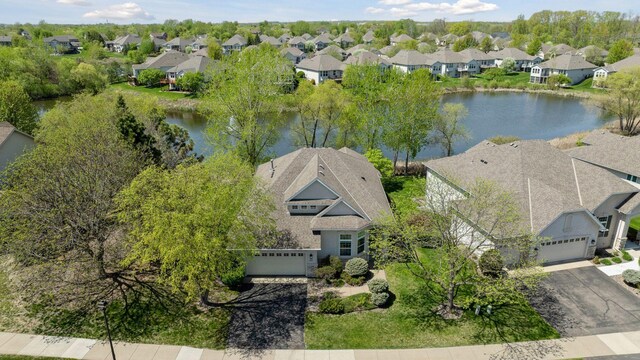 4555 Jewel Ln N, Plymouth, MN 55446 - aerial perspective of suburban area with a nearby body of water