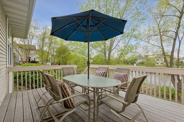 4555 Jewel Ln N, Plymouth, MN 55446 - wooden deck featuring outdoor dining space