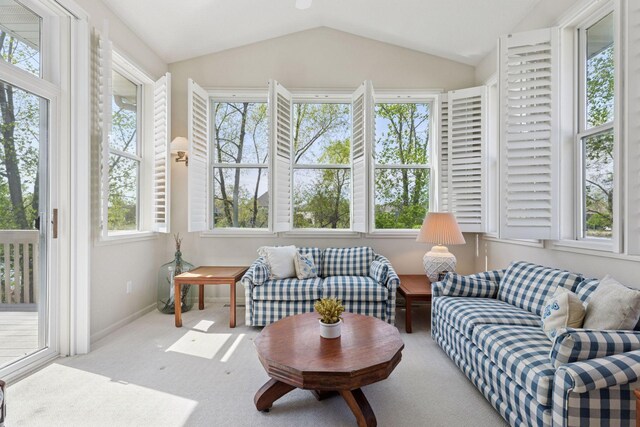 4555 Jewel Ln N, Plymouth, MN 55446 - sunroom / solarium with plenty of natural light, vaulted ceiling, carpet floors, and baseboards