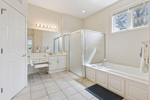 4555 Jewel Ln N, Plymouth, MN 55446 - full bathroom with a shower stall, vanity, a bath, tile patterned flooring, and recessed lighting