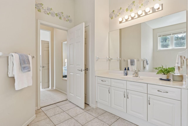 4555 Jewel Ln N, Plymouth, MN 55446 - bathroom featuring vanity, tile patterned flooring, and baseboards