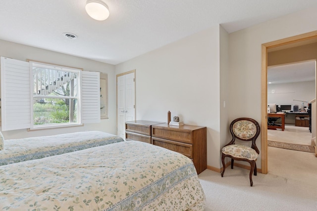 4555 Jewel Ln N, Plymouth, MN 55446 - bedroom featuring light colored carpet, a desk, and baseboards
