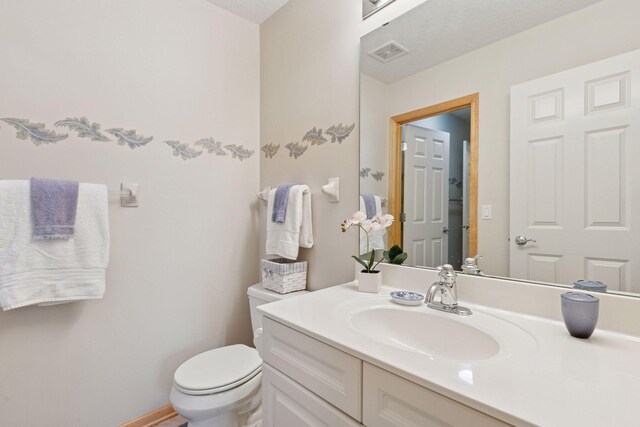 4555 Jewel Ln N, Plymouth, MN 55446 - bathroom with toilet and vanity