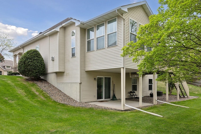 4555 Jewel Ln N, Plymouth, MN 55446 - back of house with a patio and a yard