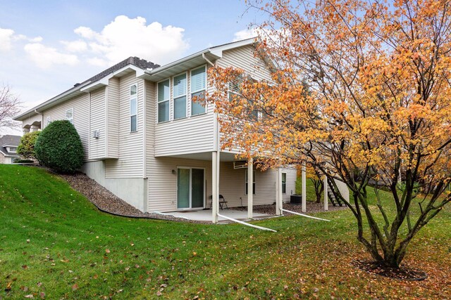 4555 Jewel Ln N, Plymouth, MN 55446 - back of property with a patio area and a yard